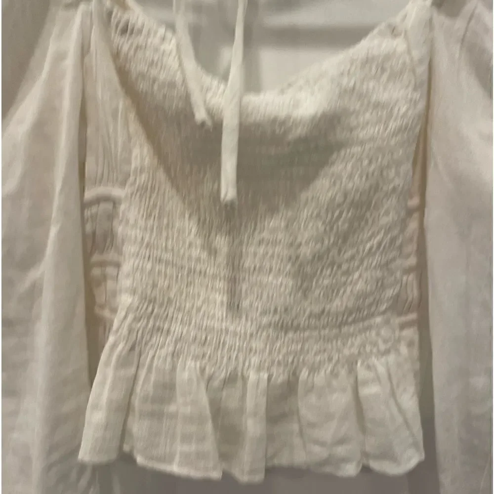 Free People Chloe puff sleeve blouse in white.Size M